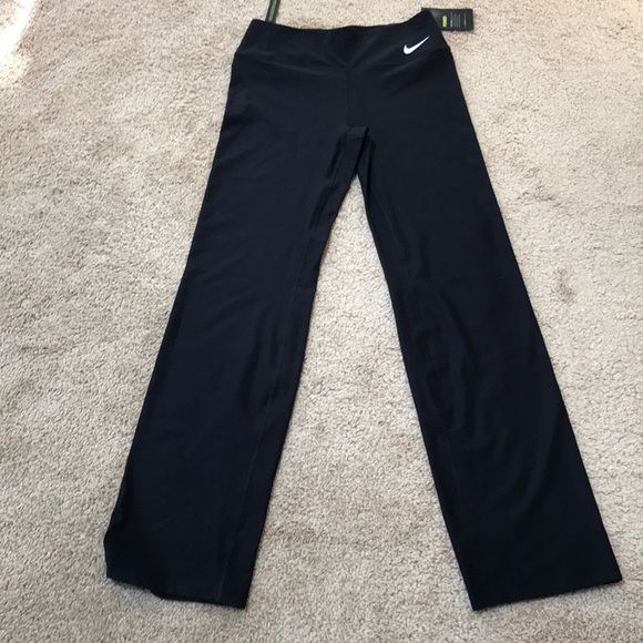 Nike Pants - NWT! NIKE Size M black mid rise full length pants
